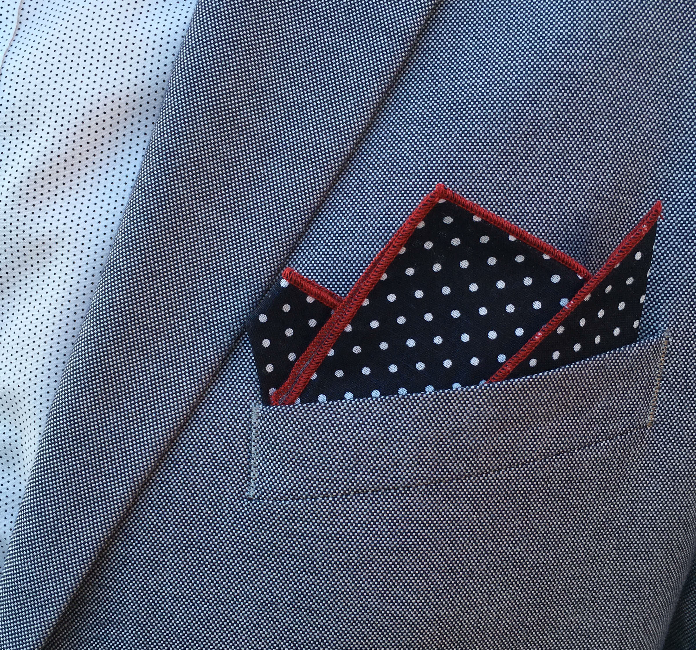 Two gentlemen together with a pretty women showing their classy di Venisco pocket square.