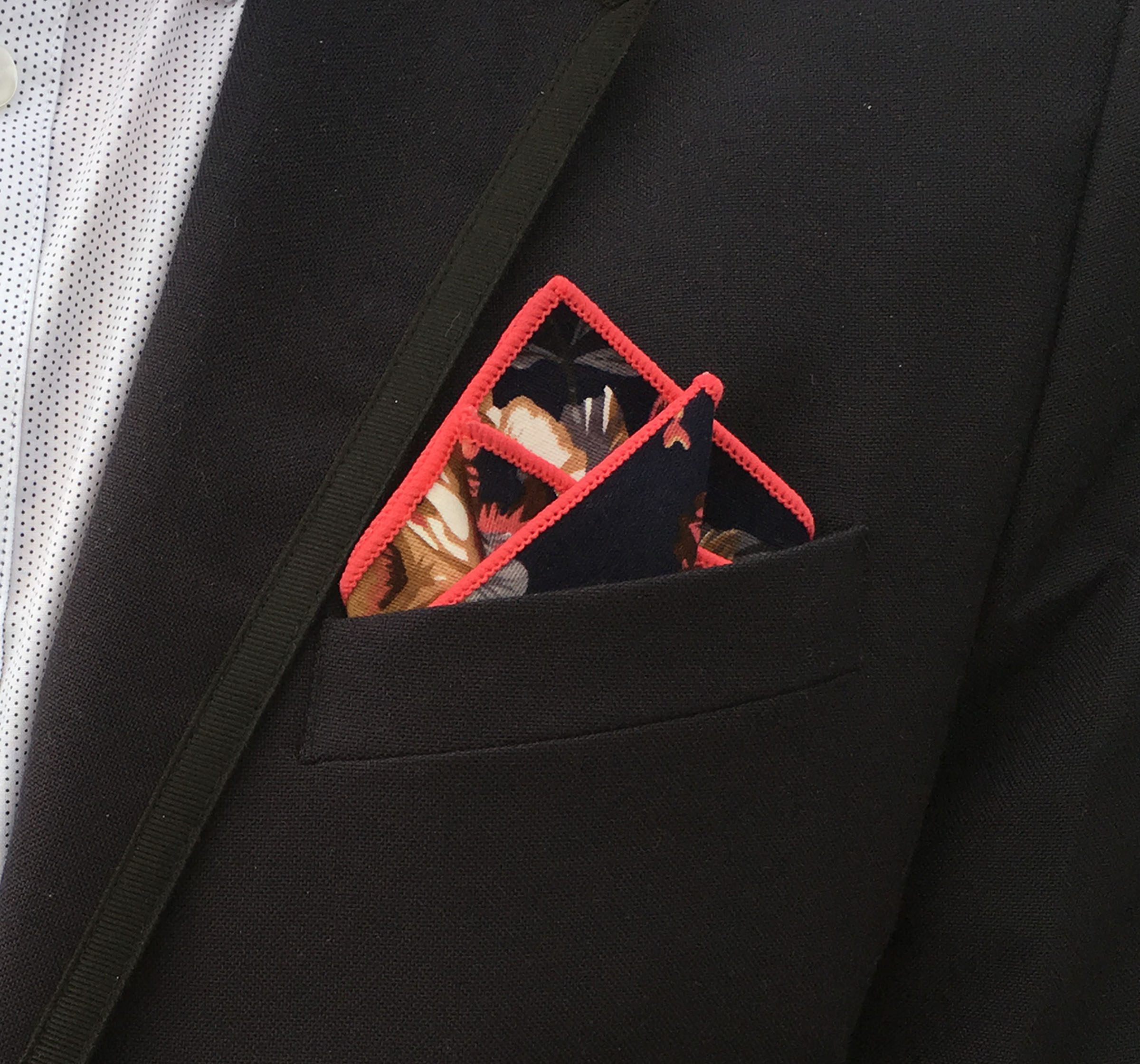 Two gentlemen together with a pretty women showing their classy di Venisco pocket square.