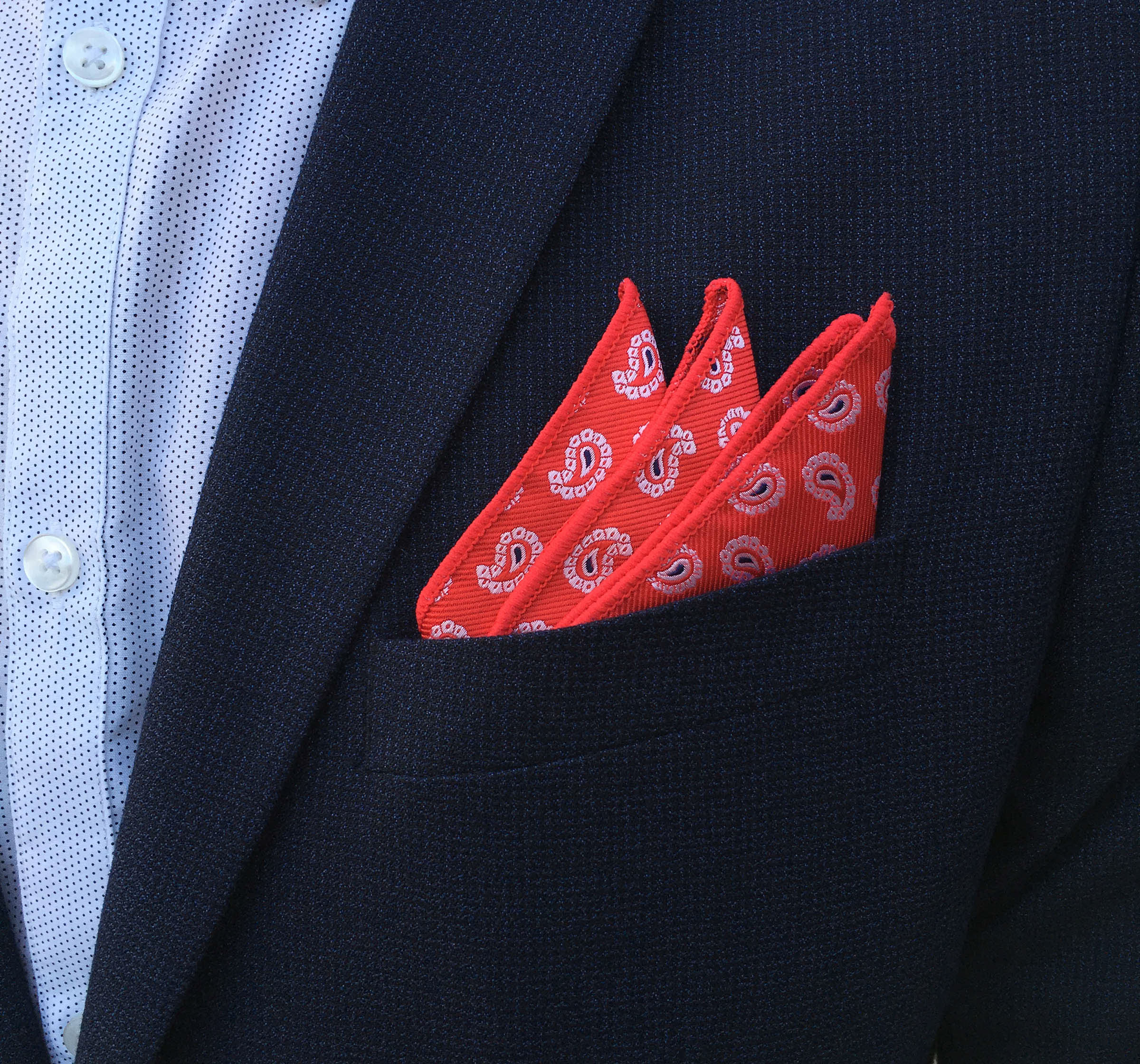 Two gentlemen together with a pretty women showing their classy di Venisco pocket square.